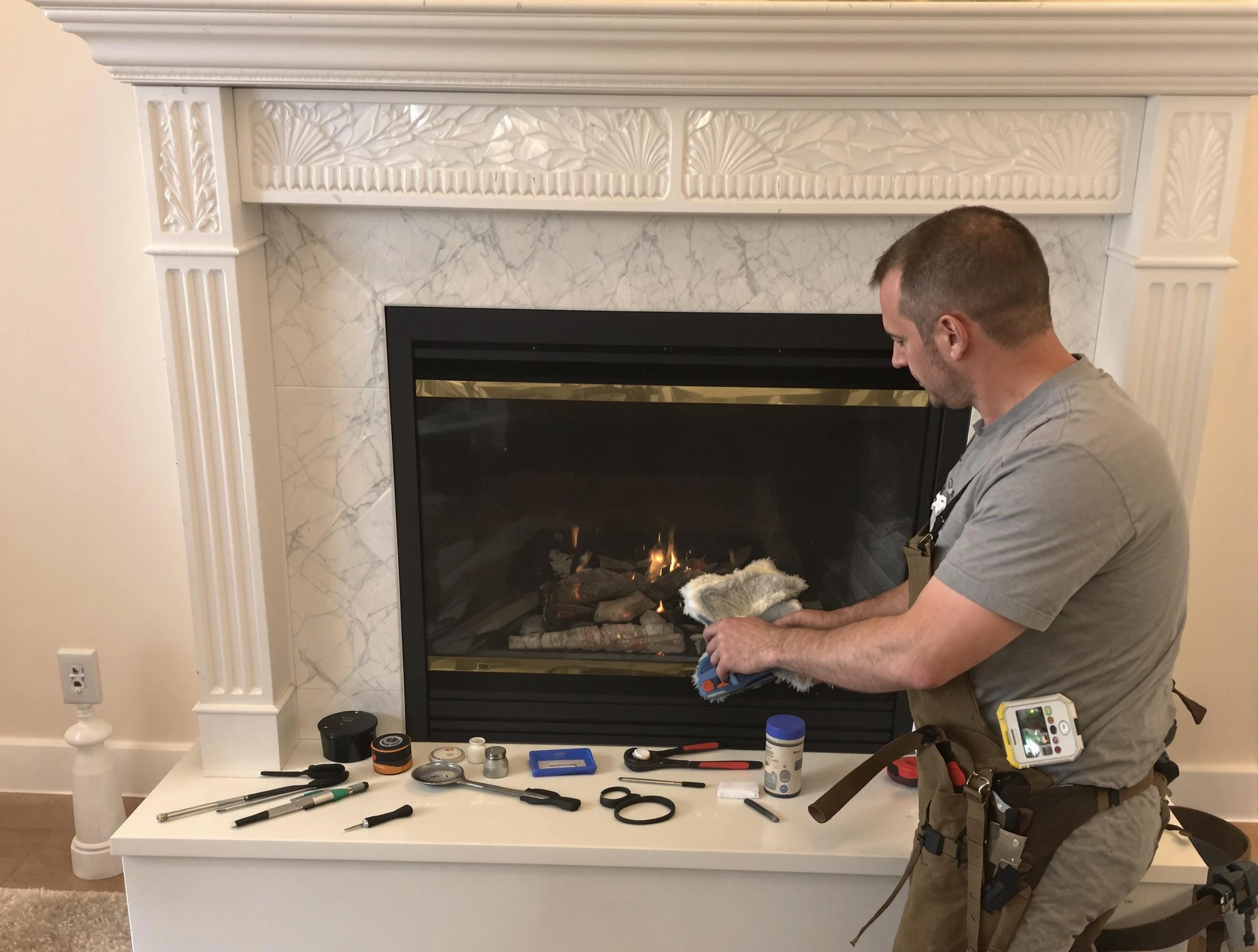Danvers Chimney Sweep performing fireplace maintenance in Danvers, MA